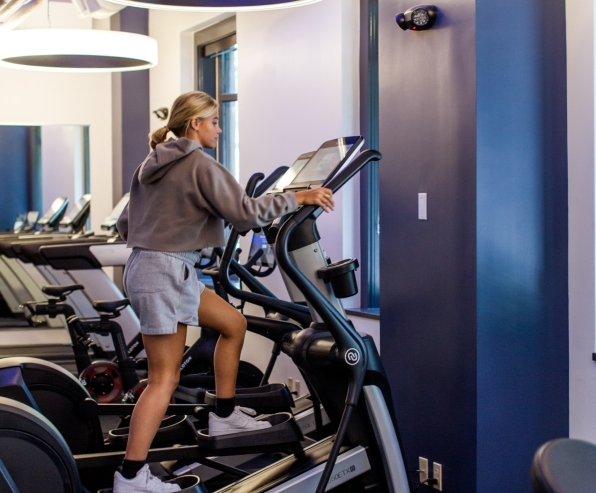 woman working out in the hotel gym