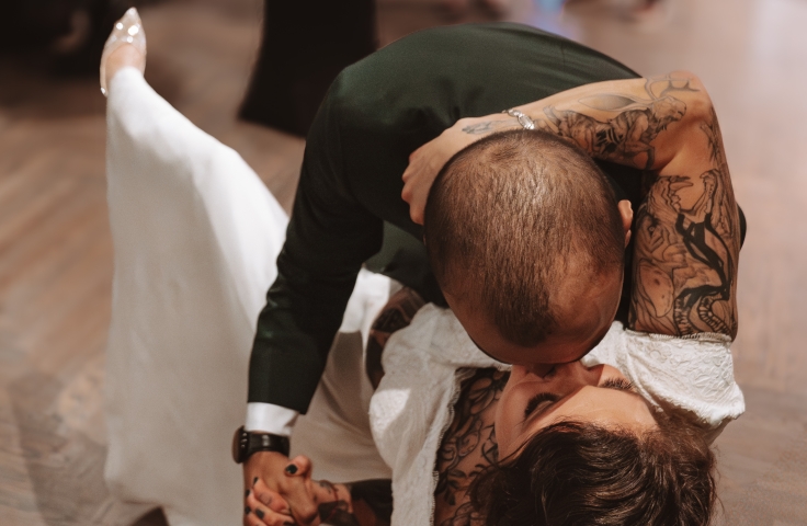 Wedding couple kissing at the Heathman Hotel